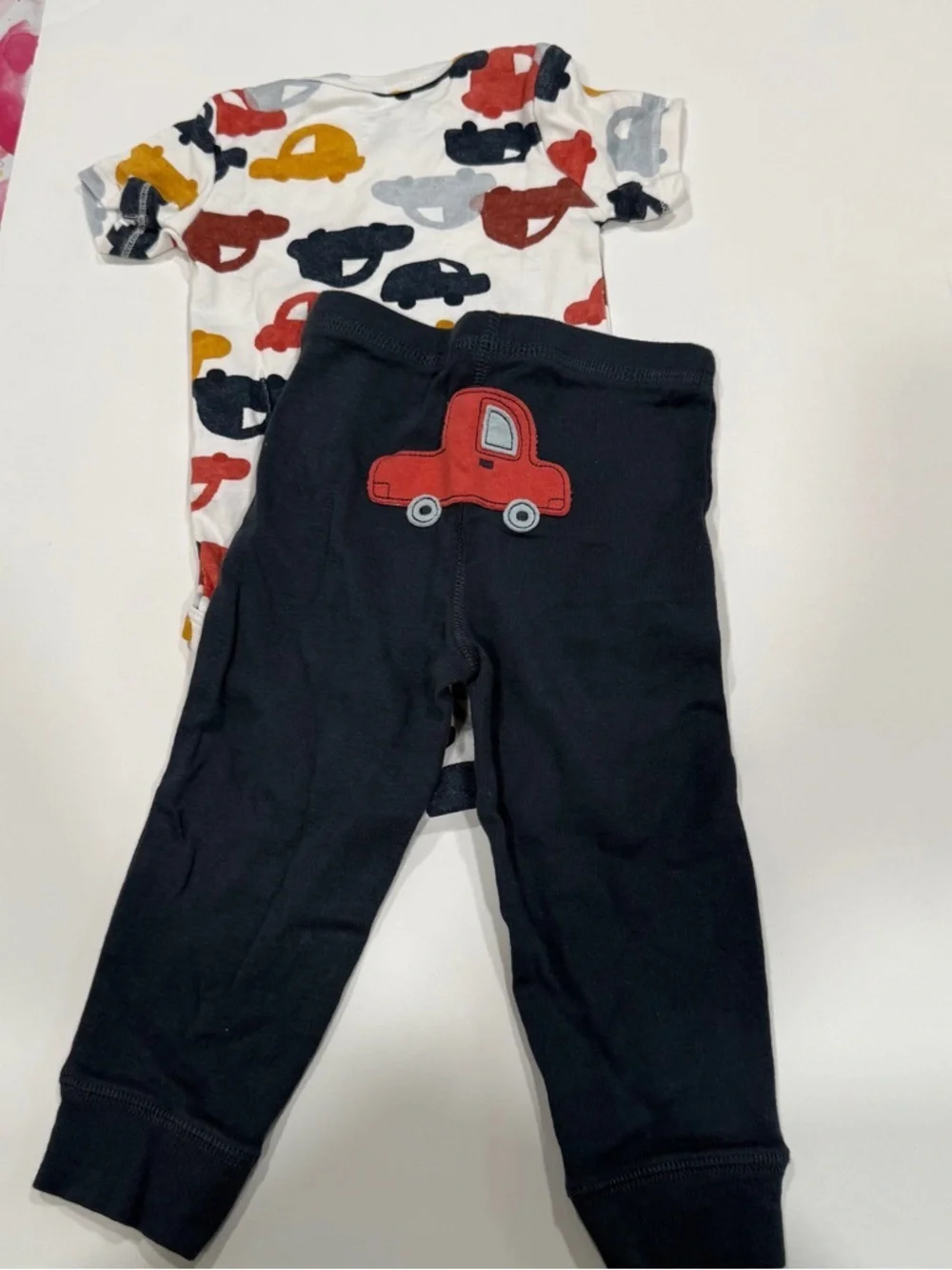 Carter’s two-piece short sleeve shirt and pants cars size 9 to 12 months
